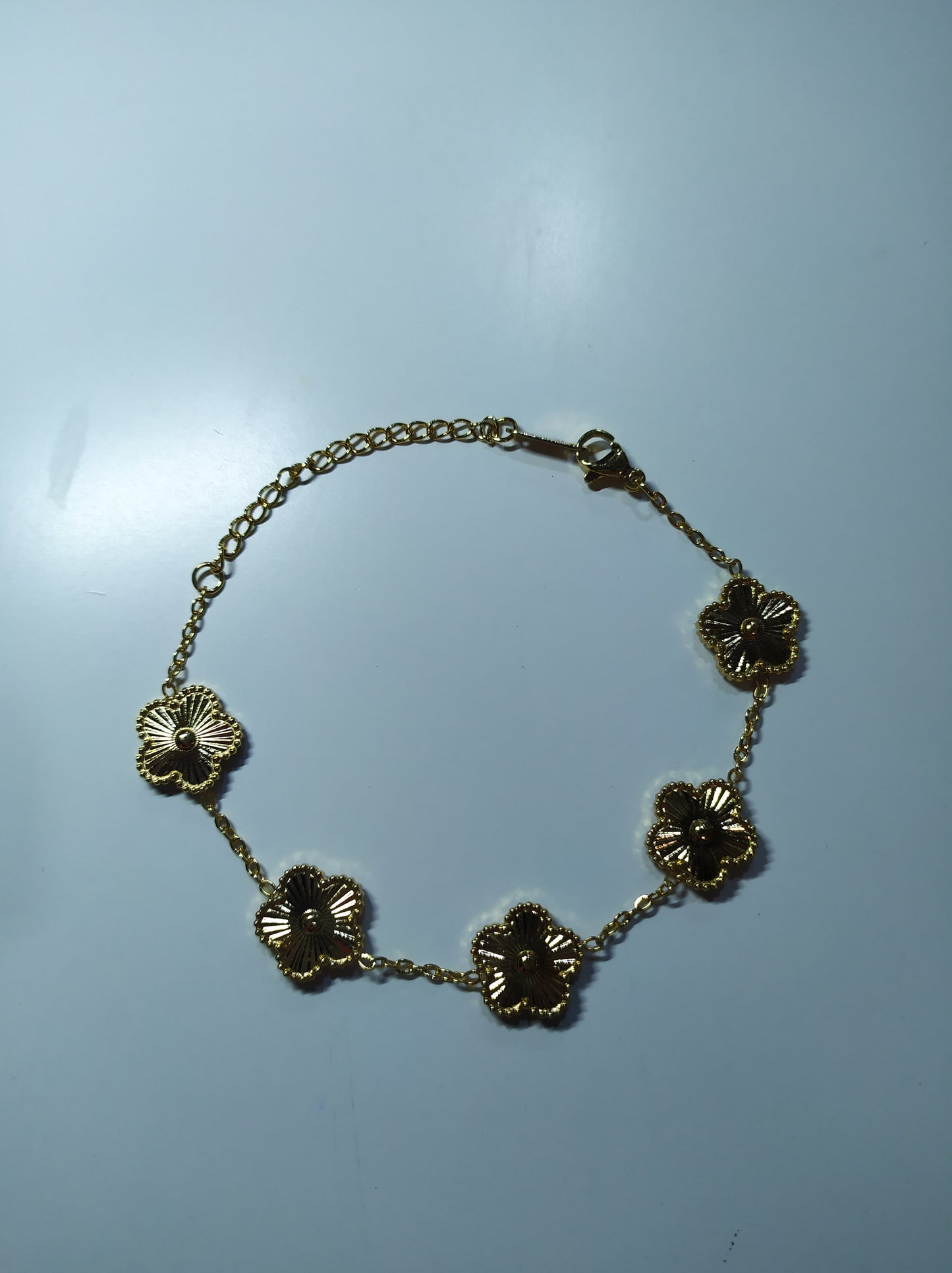 Pulsera trebol de cinco hojas oro